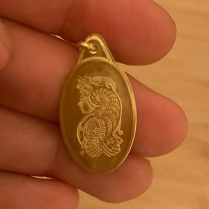 18 k gold pendant.